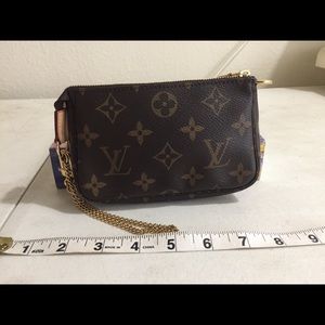 Authentic Louis Vuitton pouchette